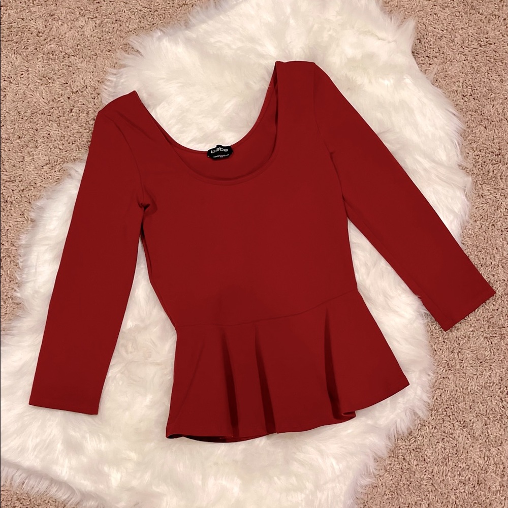 BeBe Dressy Top in dark red/burgundy/maroon.